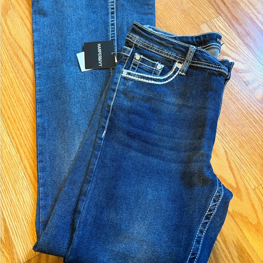 Women's Blue Boot Cut Jeans with designed pockets